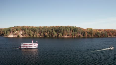 au sable river queen boat on the au sable river in michigan with drone video stable shot