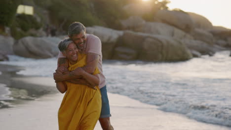 senior, couple and running at beach for hug