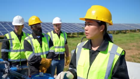 team of renewable energy workers collaborate on solar panel maintenance, ensuring efficient operation and safety measures on a bright sunny day