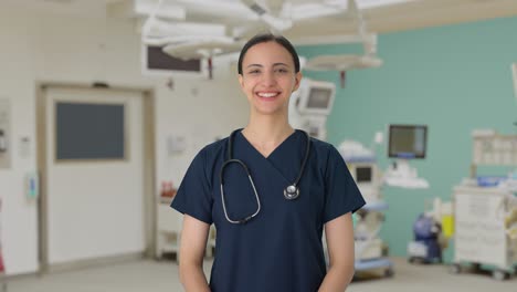 Happy-Indian-female-doctor-putting-stethoscope-on