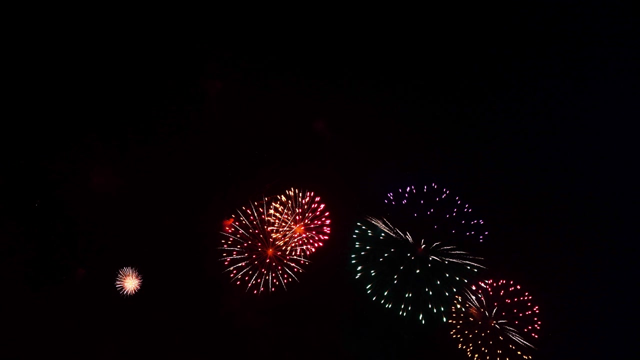 Beautiful colourful fire work display at night for celebration in festival