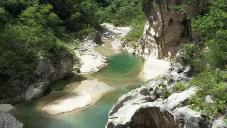 charcos del nizao, shallow and clear water of nizao river with rock formation on a sunny day in dominican republic