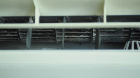 dirty air conditioner fan needs cleaning