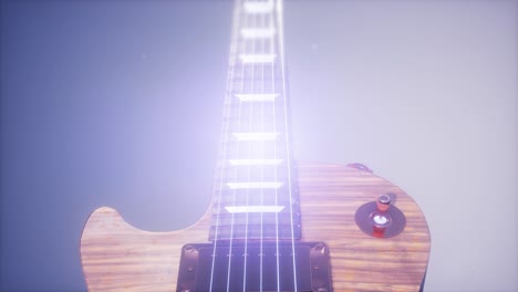 guitarra eléctrica sobre un fondo azul