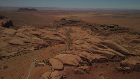 aerial drone footage captured the landscape of death valley mountain, with vehicles coming to a halt in the midst of it