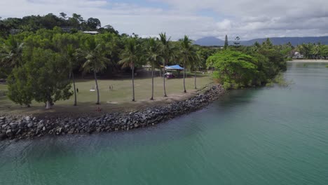 people having fun at rex smeal park and playground in port douglas, queensland