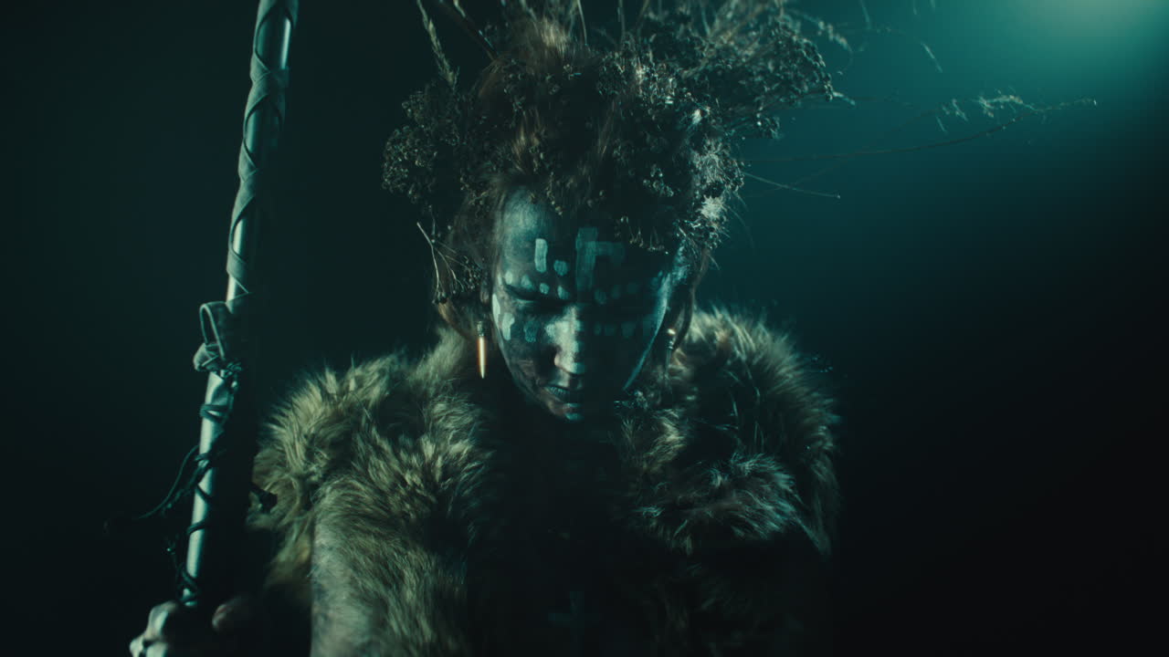 A creepy witch rises her head during the night storm