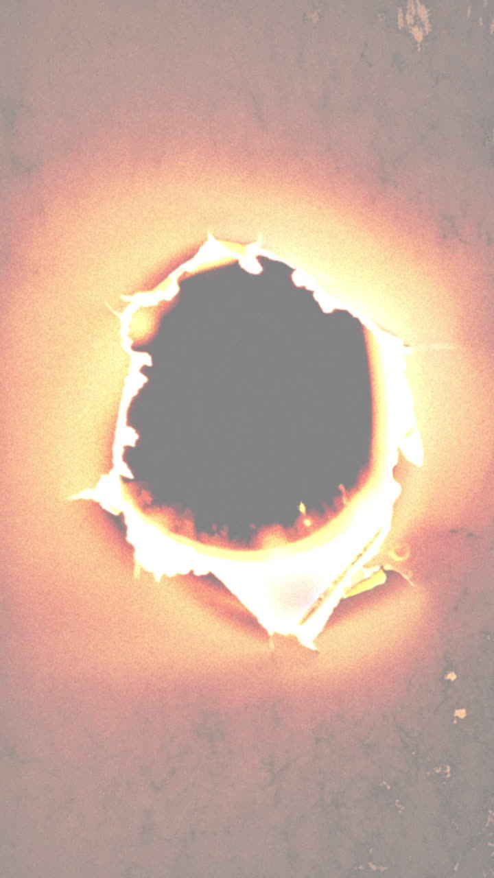 Expanding Fiery Hole Burning Through Abstract Material