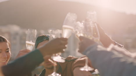 young group of friends celebrating rooftop party making toast drinking alcohol enjoying reunion celebration on weekend social gathering at sunset