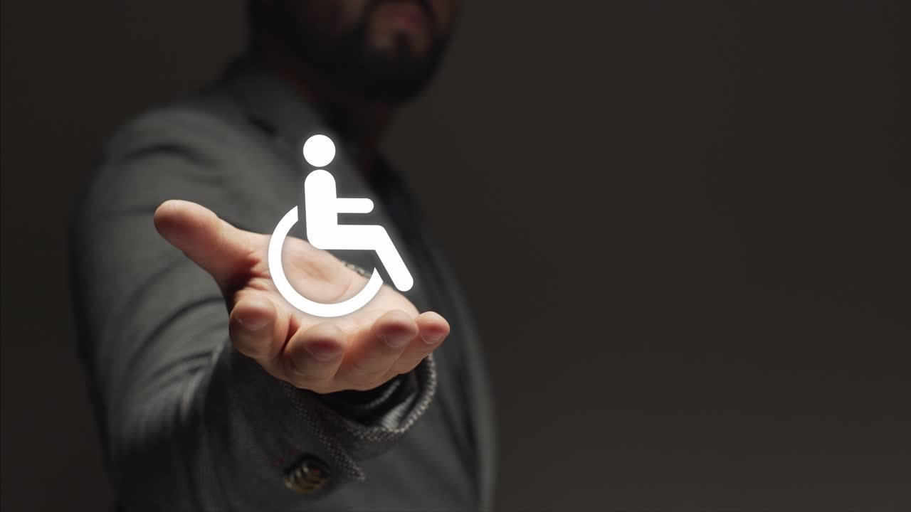 concept of disability. business person shows symbol of person in wheelchair inclusion. equality