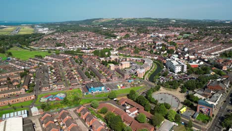 wide advancing aerial gv of east belfast, northern ireland, uk on a bright and sunny day. produced in 4k, 60fps and with rec709 color