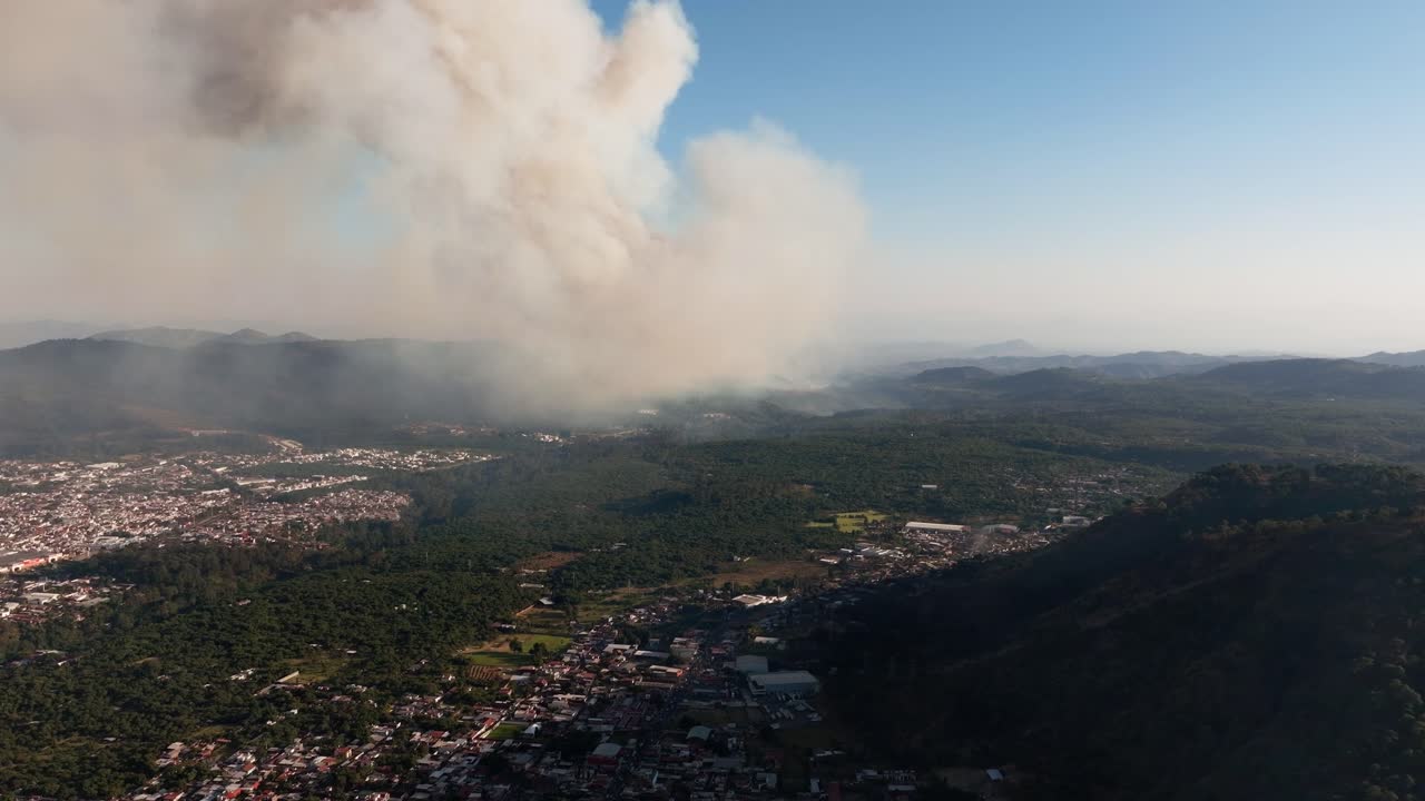 DRONE: DOLLY IN SHOT OF A WILD FIRE AT URUAPAN MICHOACAN