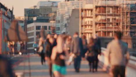 anonymous crowd of people walking  commuters london city street slow motion