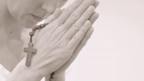 praying to god with hands together with cross stock video stock footage