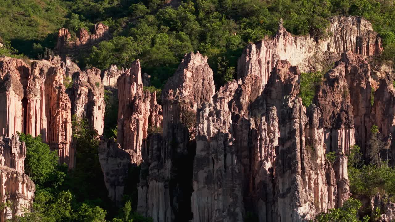 Stunning dolly right aerial shot of the los estoraques rock formations in colombia, a unique natural area
