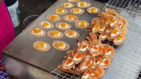 preparing thai crispy crepes