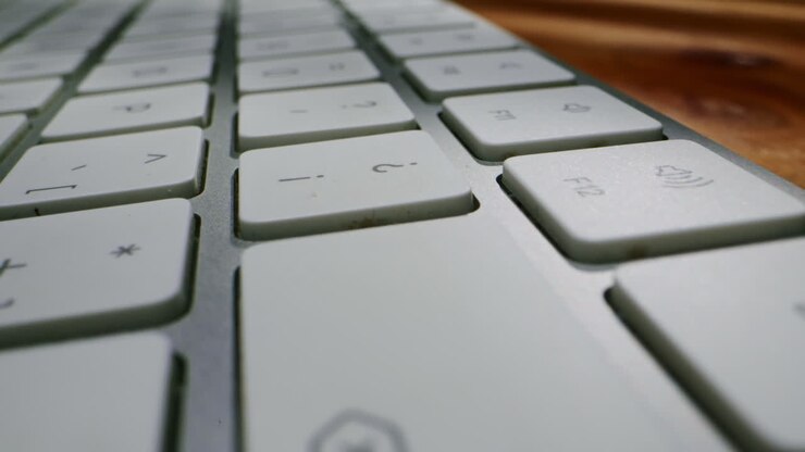 This is a detailed view of a sleek, modern keyboard that showcases its smooth keys and elegant overall design