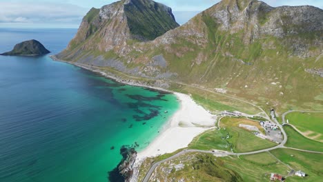 haukland beach in lofoten islands, norway - aerial 4k tilting down