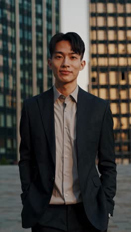 businessman in front of modern cityscape