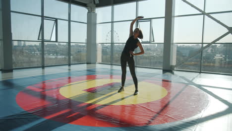 woman stretching in a gym