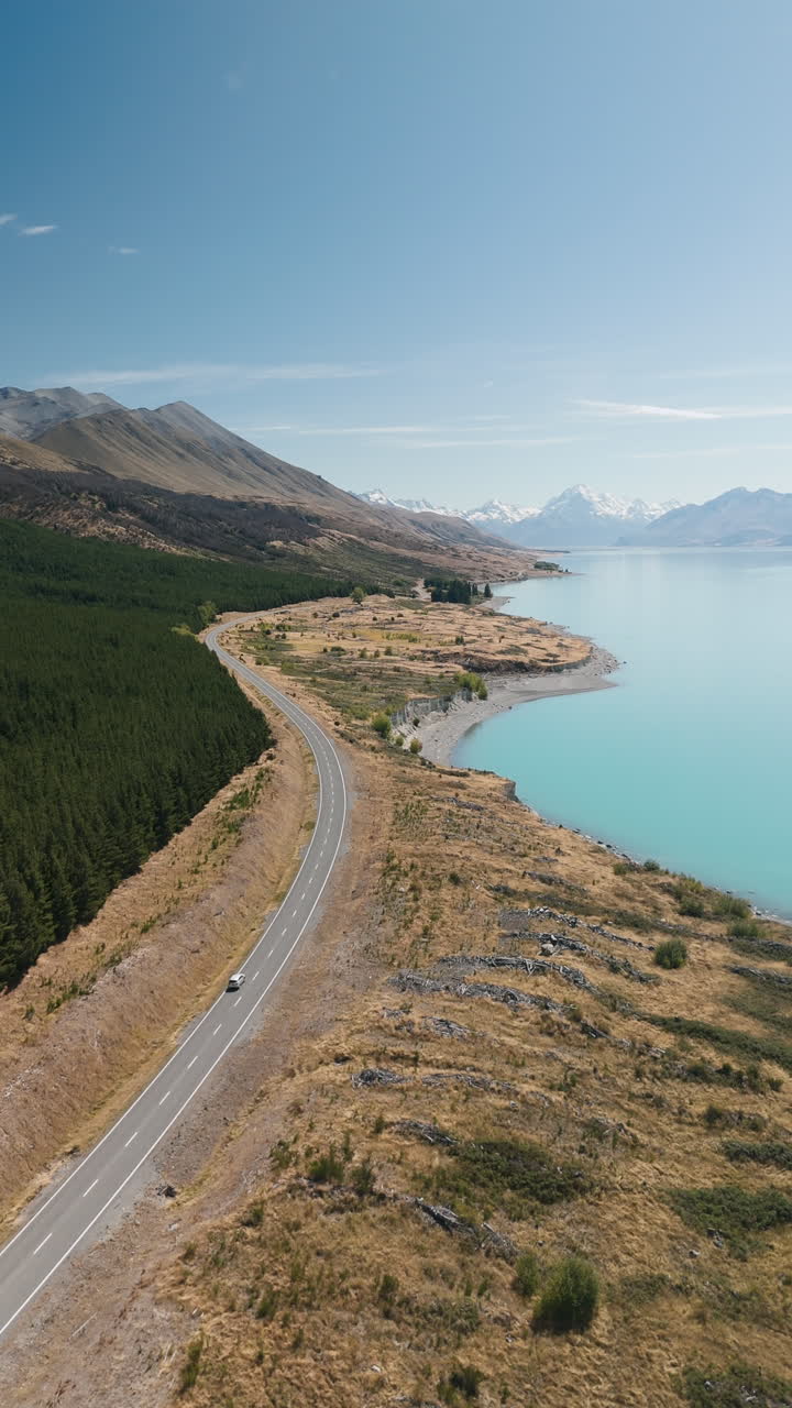 Scenic Road Trip Along a Turquoise Lake in New Zealand