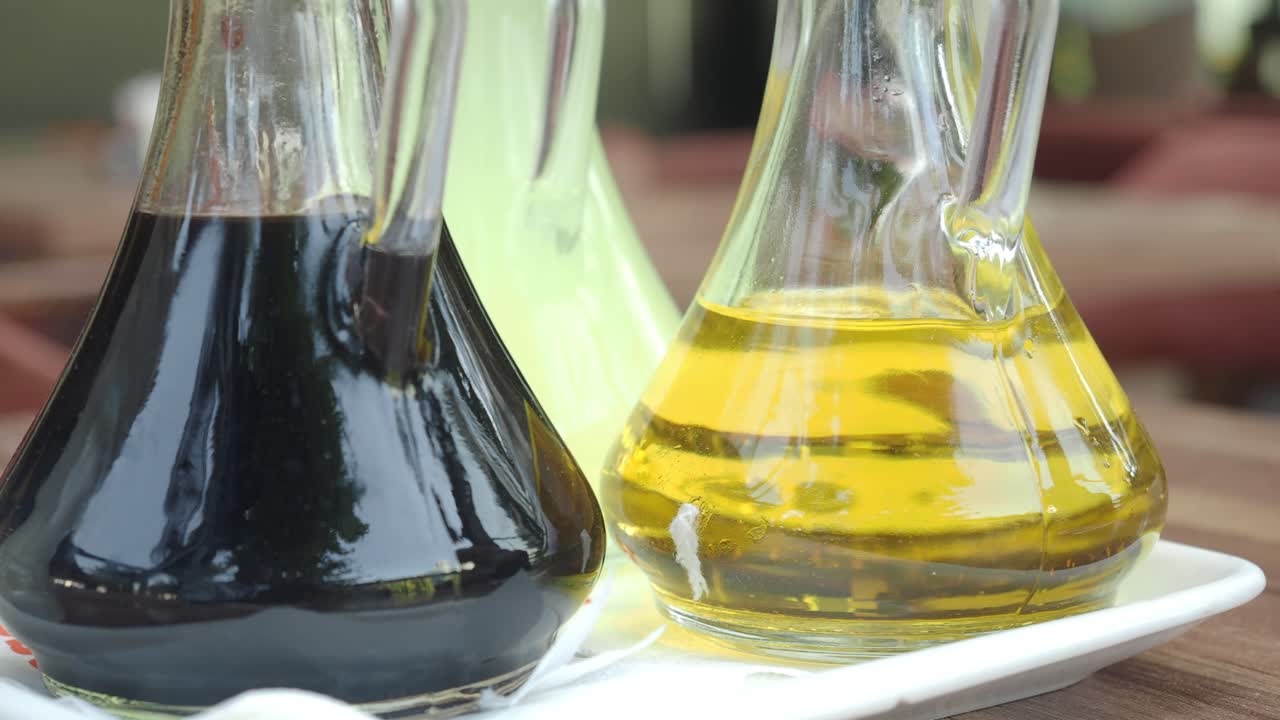 Olive Oil and Vinegar Bottles on a Table