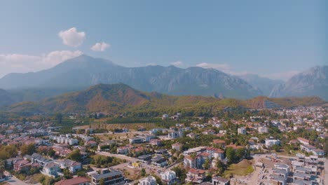 aerial view of a mountainous town with houses and villas