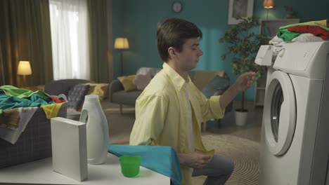 man doing laundry