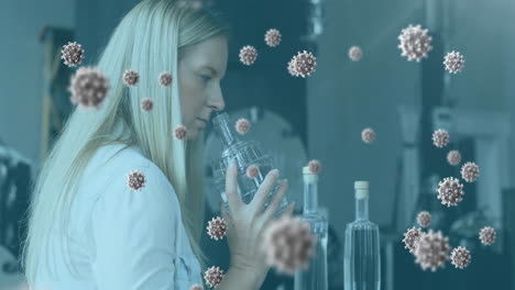 células de covid-19 contra una mujer científica que trabaja en un laboratorio
