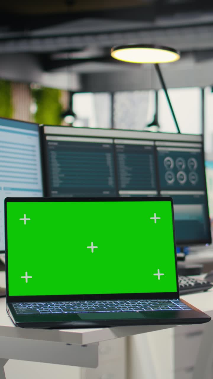 Vertical Video Empty office environment showcases modern tools of chroma key and resources