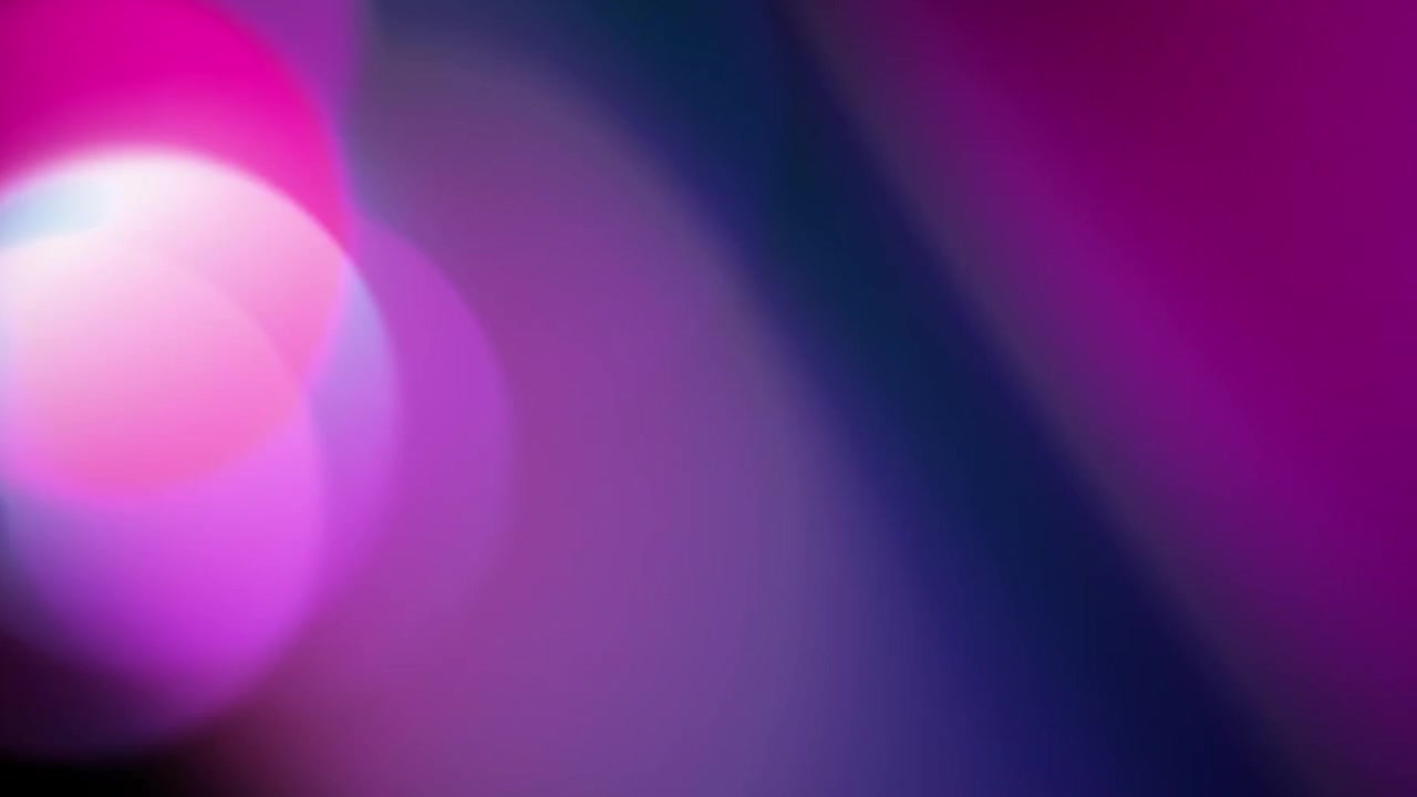 Abstract Background with Moving Pink and Blue Light Bokeh