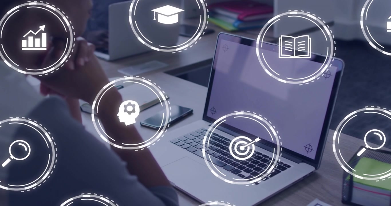 Professional Woman Using Laptop with Animated Business and Education Icons
