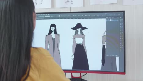 fashion designer working on digital illustration