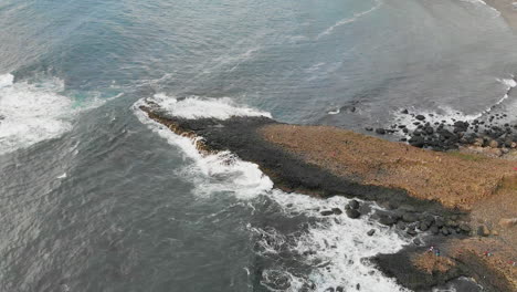 aerial zoom in of the giant's causeway shore in northern ireland