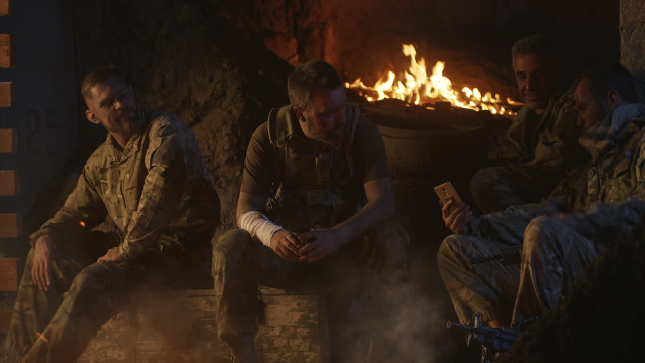Soldiers Relaxing Around a Campfire