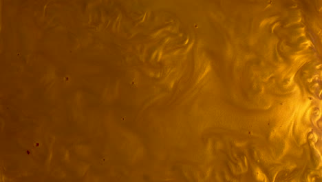 Liquid-gold-with-small-waves