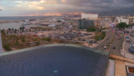 the skyline of beirut lebanon with an infinity pool in the foreground