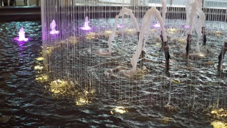 indoor fountain with colorful lights