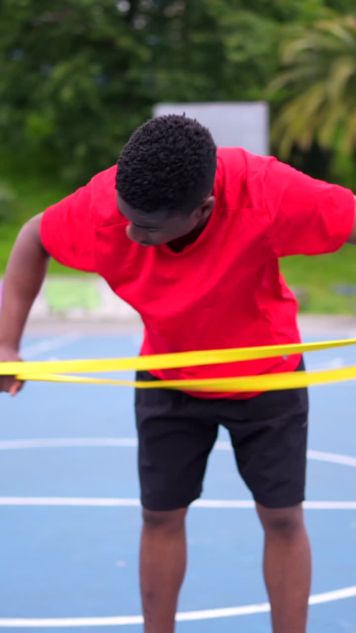 Man Exercising with Resistance Band
