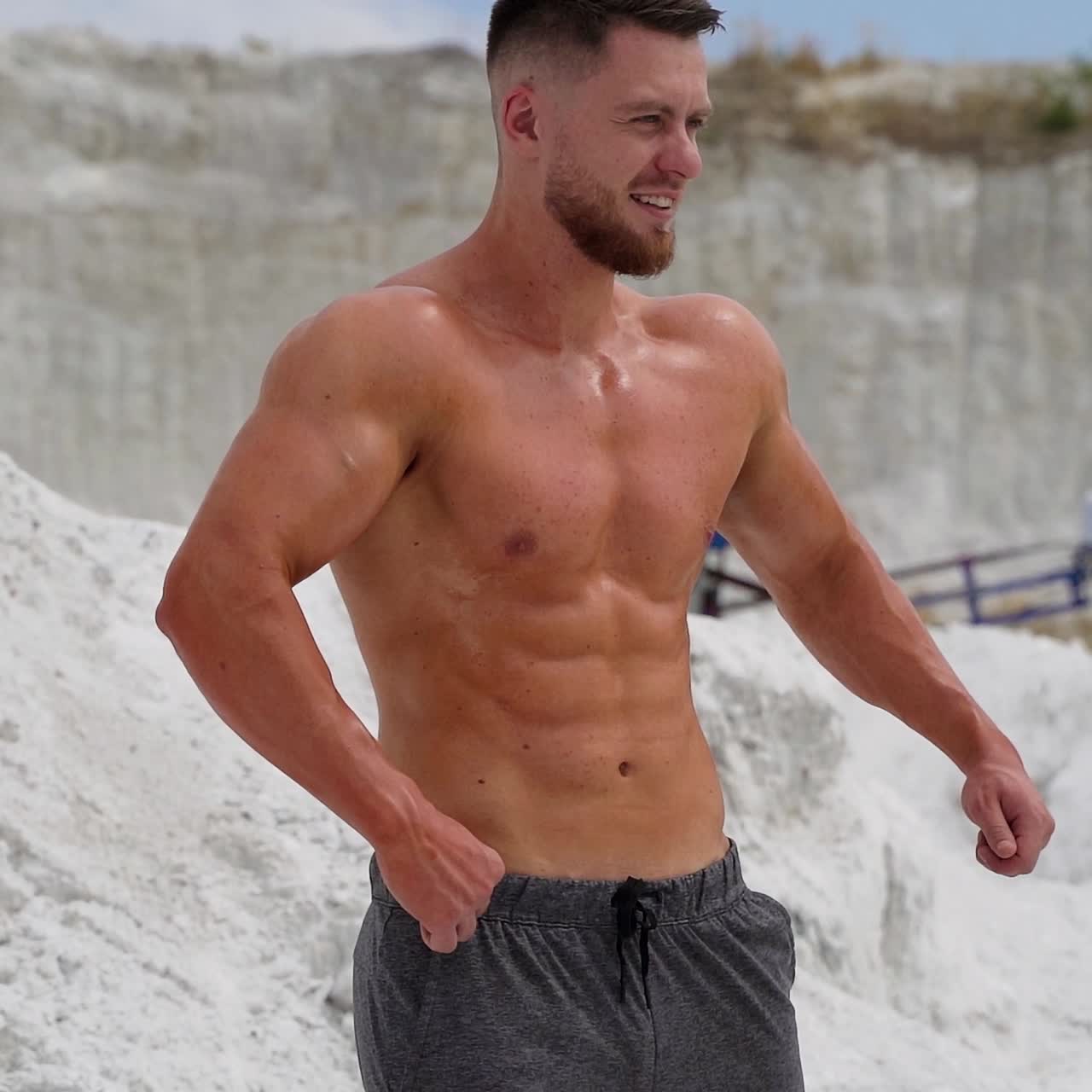 Man showing her perfect abs