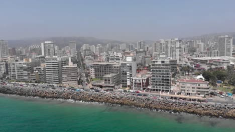 Rotating-aerial:-Traffic-on-Av-Peru-along-Valparaiso-ocean-waterfront