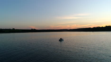 aerial over lonely boat on lakes