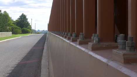 Noise-Reduction-Wall-Along-A-Motorway,-CLOSE-UP