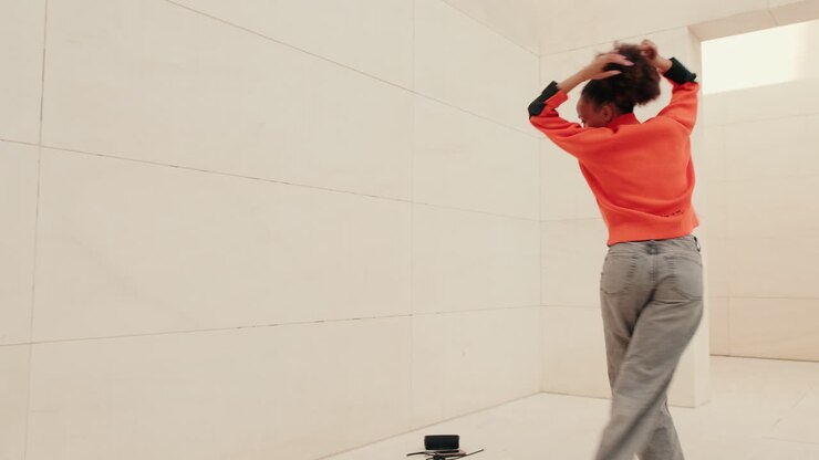 Young Woman Dances with Energy and Expression