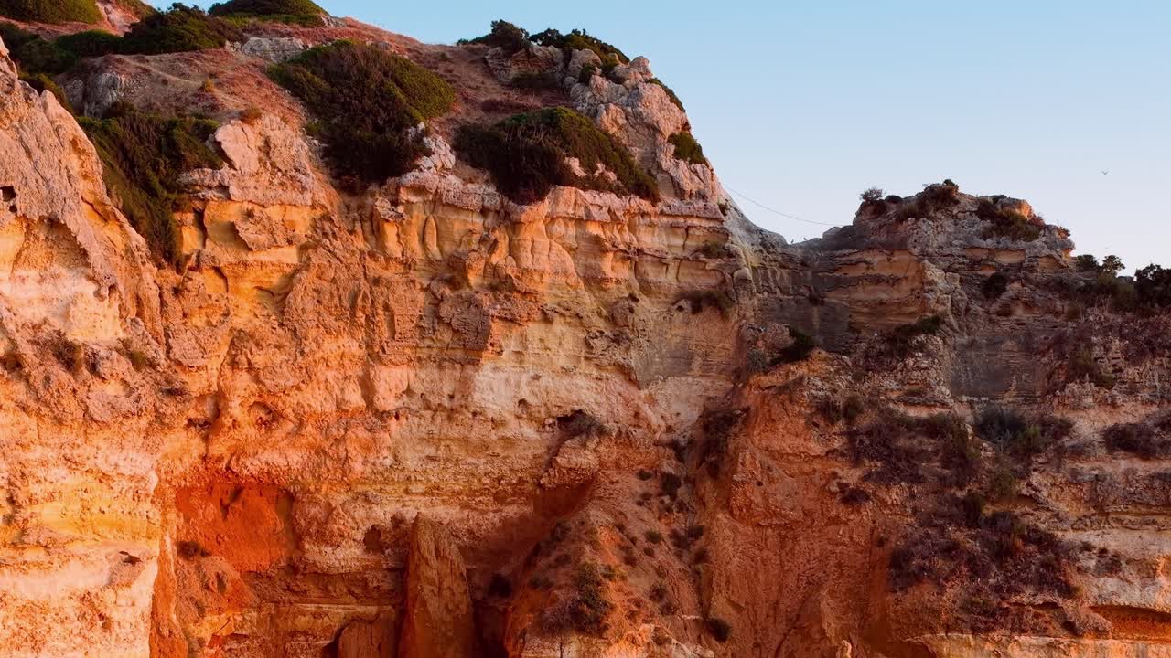 Sunset over the cliffs in Portugal during summer evening