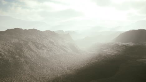 aerial vulcanic desert landscape with rays of light