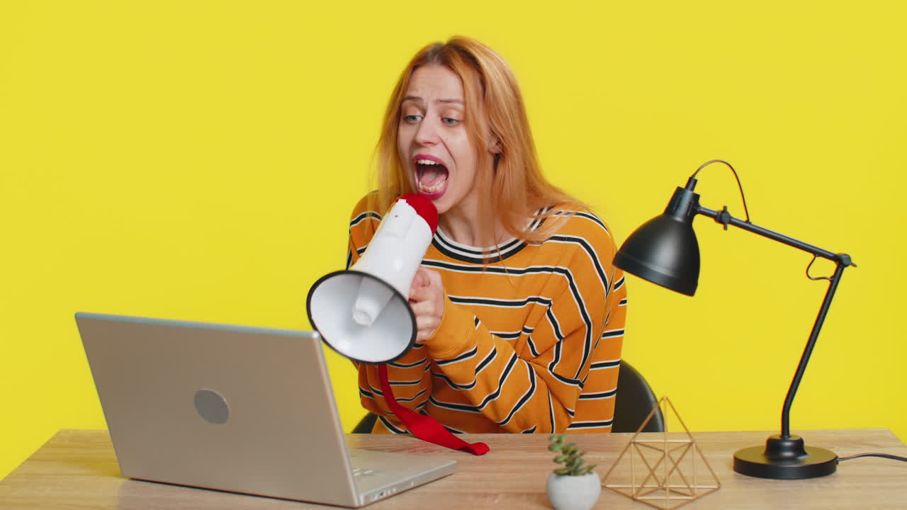 Woman arguing talking on laptop conversation by webcam quarrels expresses a problem with employees