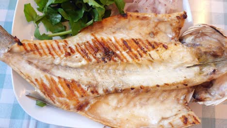 grilled fish with greens