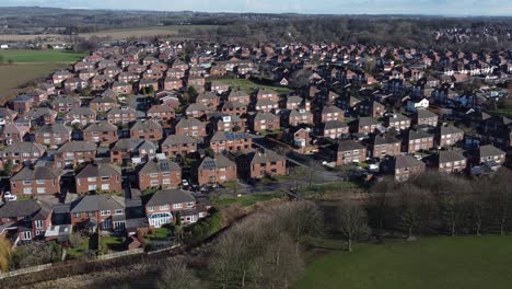 typical suburban village residential neighbourhood london townhouse rooftops aerial view dolly right forwards
