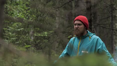 man with sparkler in the forest